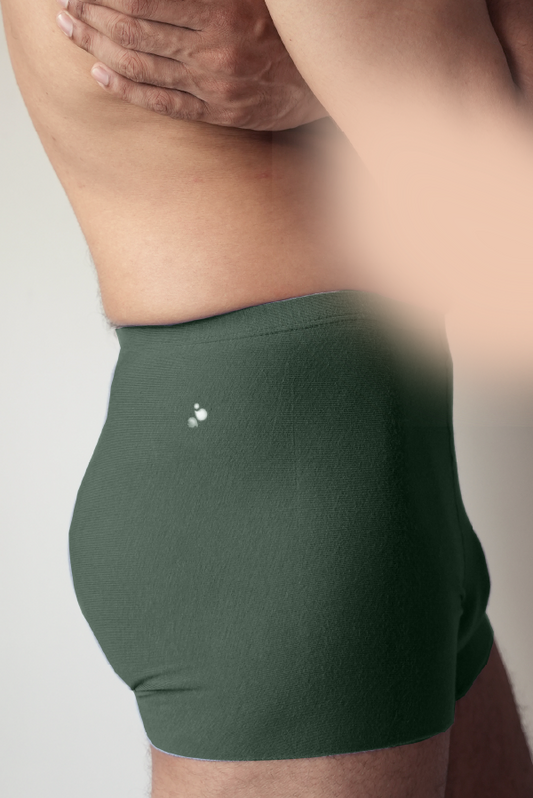 Man wearing dark green liberate underwear with comfort-fit waistband and minimal logo — breathable men’s underwear.
