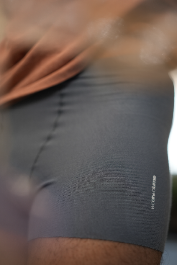 Man wearing light blue liberate underwear with comfort-fit waistband and minimal logo — breathable men’s underwear.
