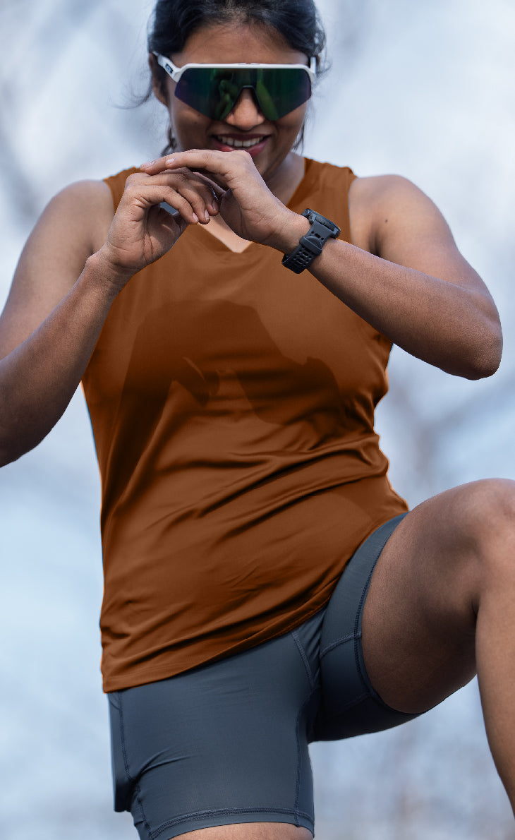 Women’s grey high-performance running tights with 4 side pockets (phone pocket) — sweat-wicking, active shorts for trail and gym workouts.